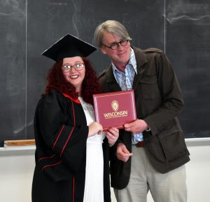 Linguistics student receiving diploma