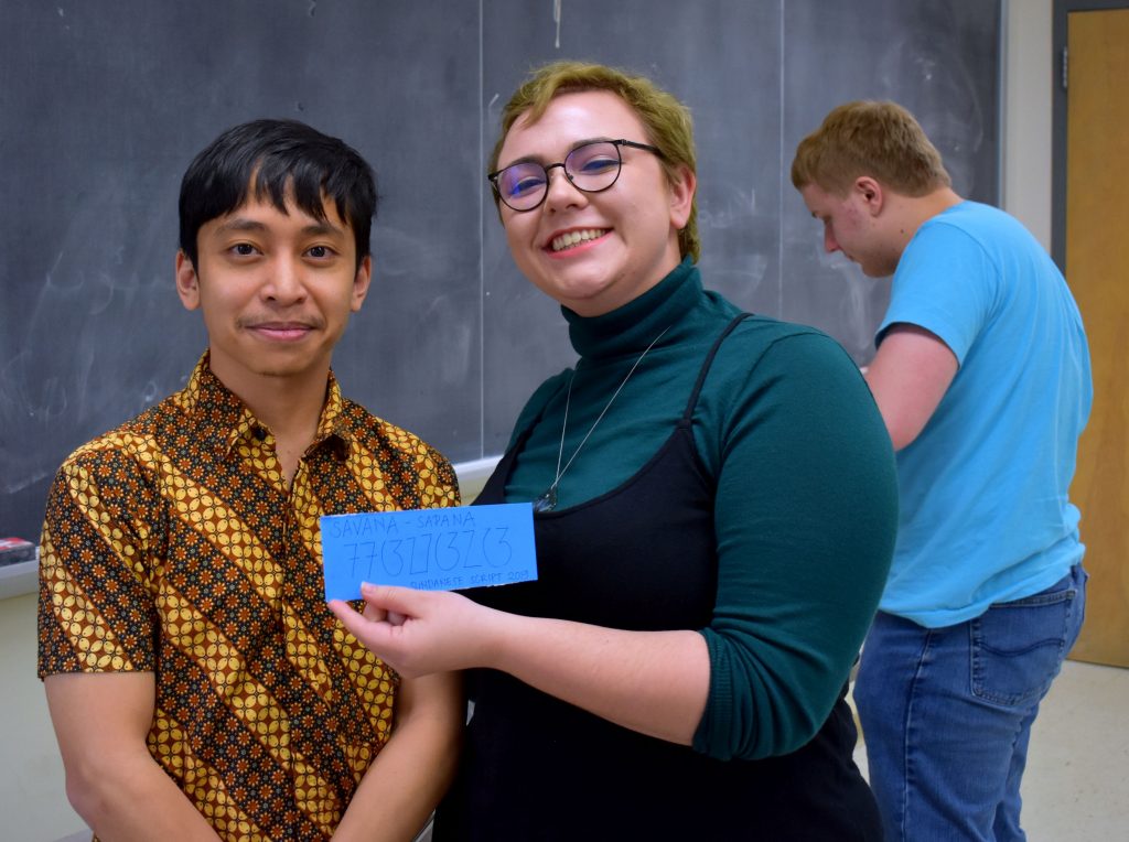 Field Methods student with Sundanese script nametag