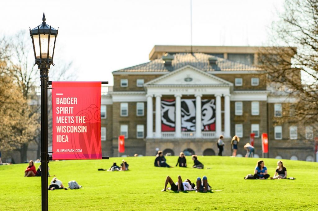 Students sitting on Bascom Hill in Spring