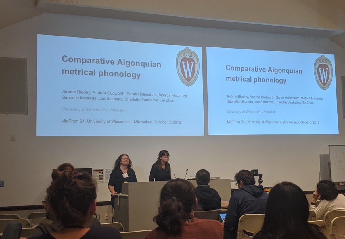Sarah Holmstrom and Charlotte Van Hecke presenting at MidPhon 24 in 2019