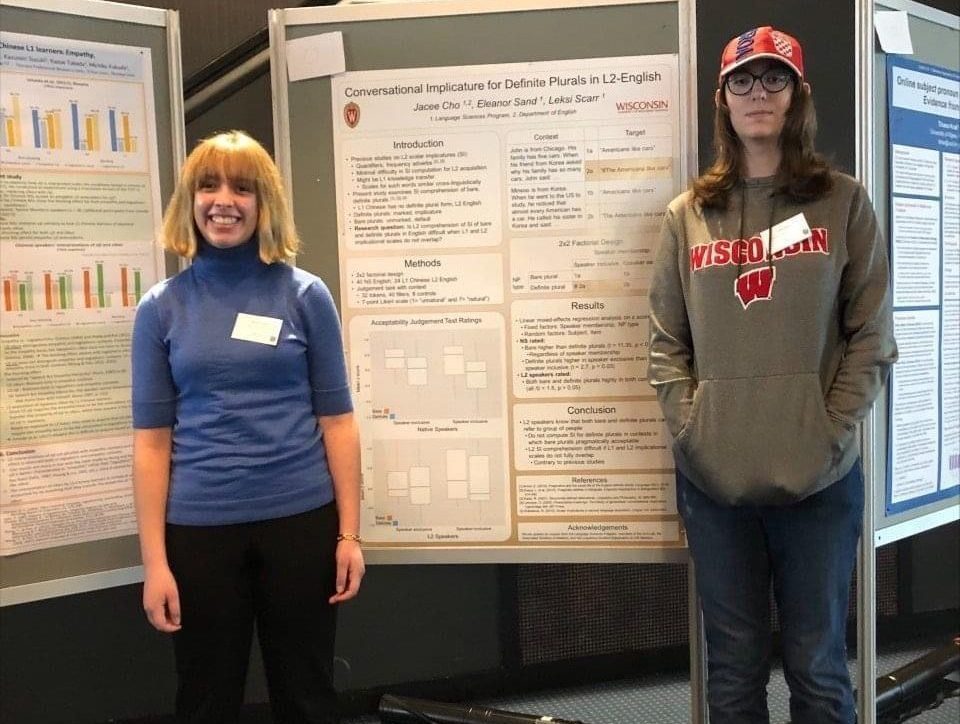 Undergraduate students Eleanor Sand and Leksi Scarr presenting their research at a conference in Norway