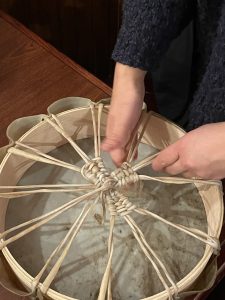 Tying the drum