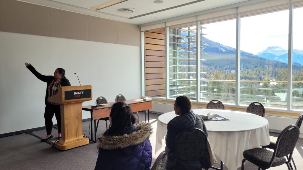 Linguistics PhD student Rachyl presenting research at the conference