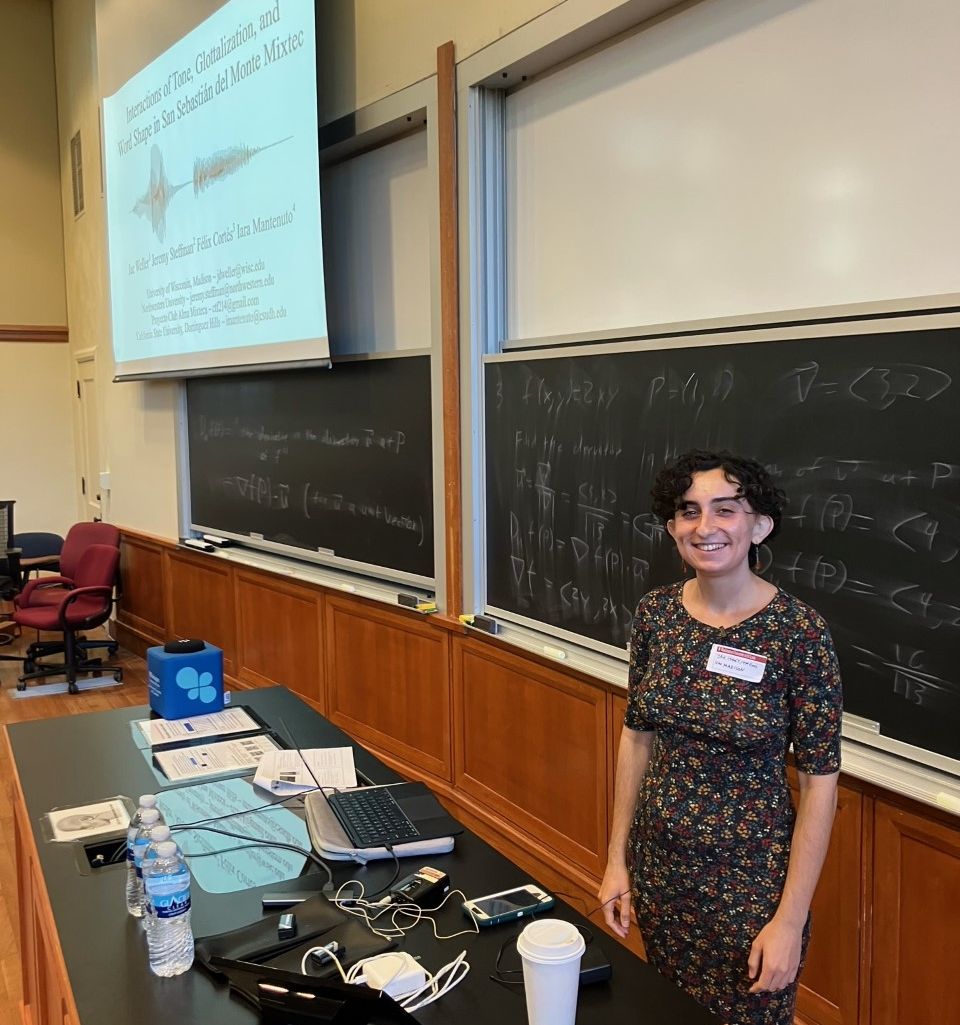 Graduate student Jae Weller presenting their research at MidPhon 22