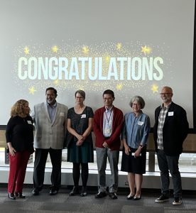 Chancellor Mnookin, WARF named professorship honorees, and Eric Iverson at a celebration of WARF named professorships in Sept., 2023