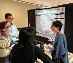 Jae Weller presenting a poster co-authored with Professor Eric Raimy
