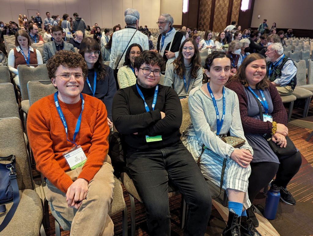 Undergrad students Jack Crabb, Martino Mangano, David Daum, Tvisha Rao, and Gwen Tuffnell with graduate students Jae Weller and Rachyl Hietpas at the LSA 2024