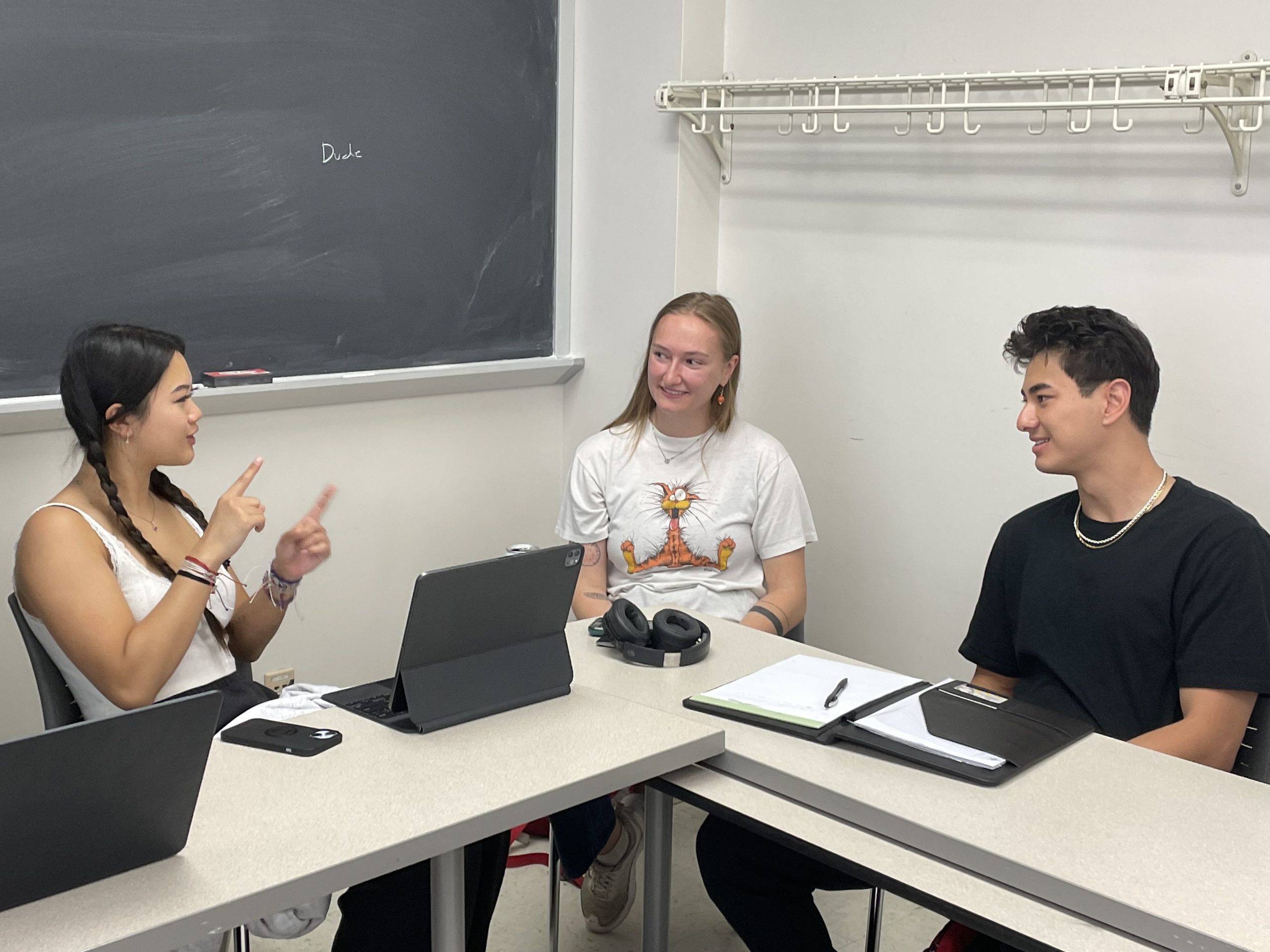 Students in ASL class practicing signing together