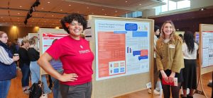 Students at the undergrad symposium poster session